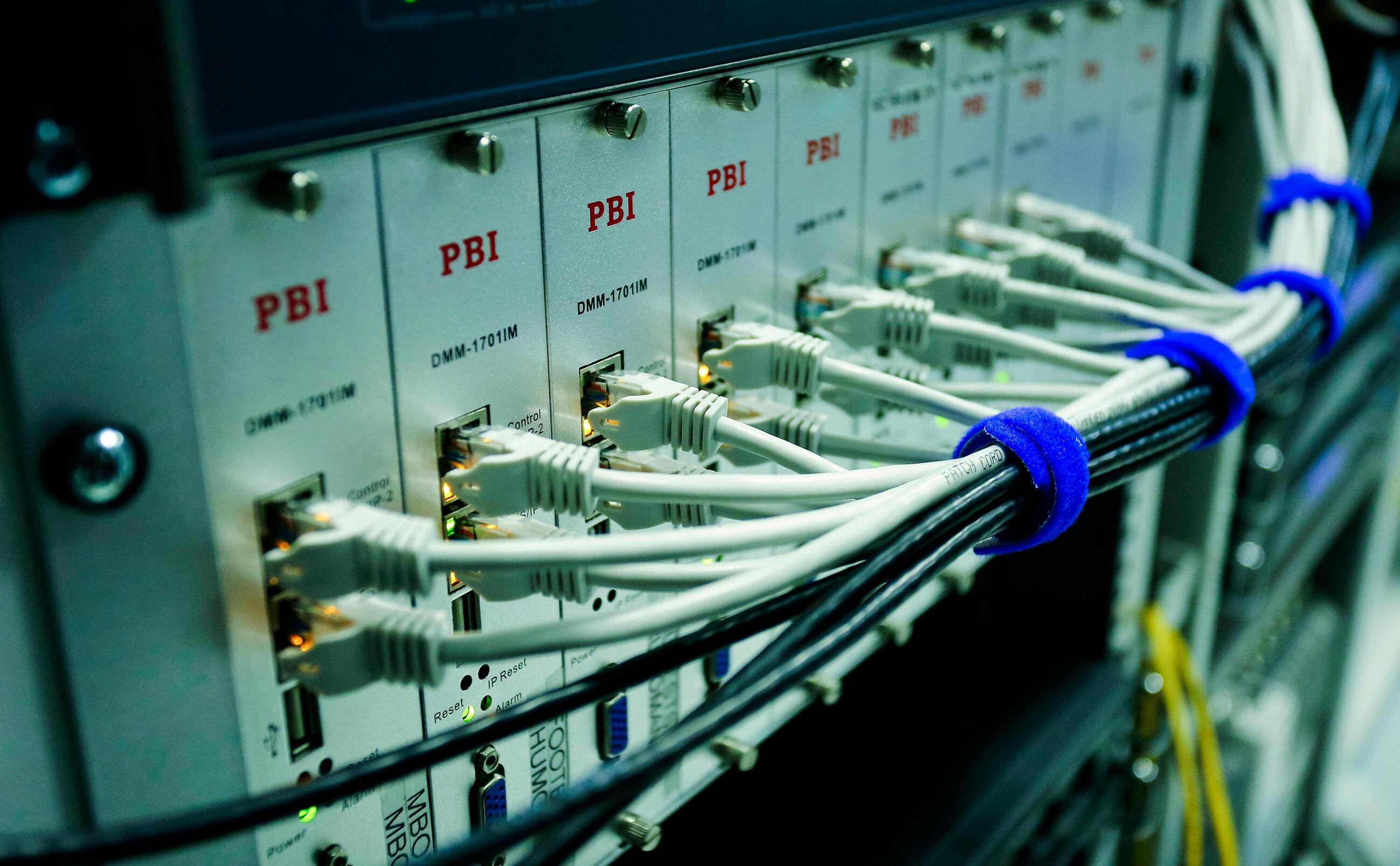 https://www.pexels.com/photo/close-up-photo-of-ethernet-cables-on-network-switch-6466143/