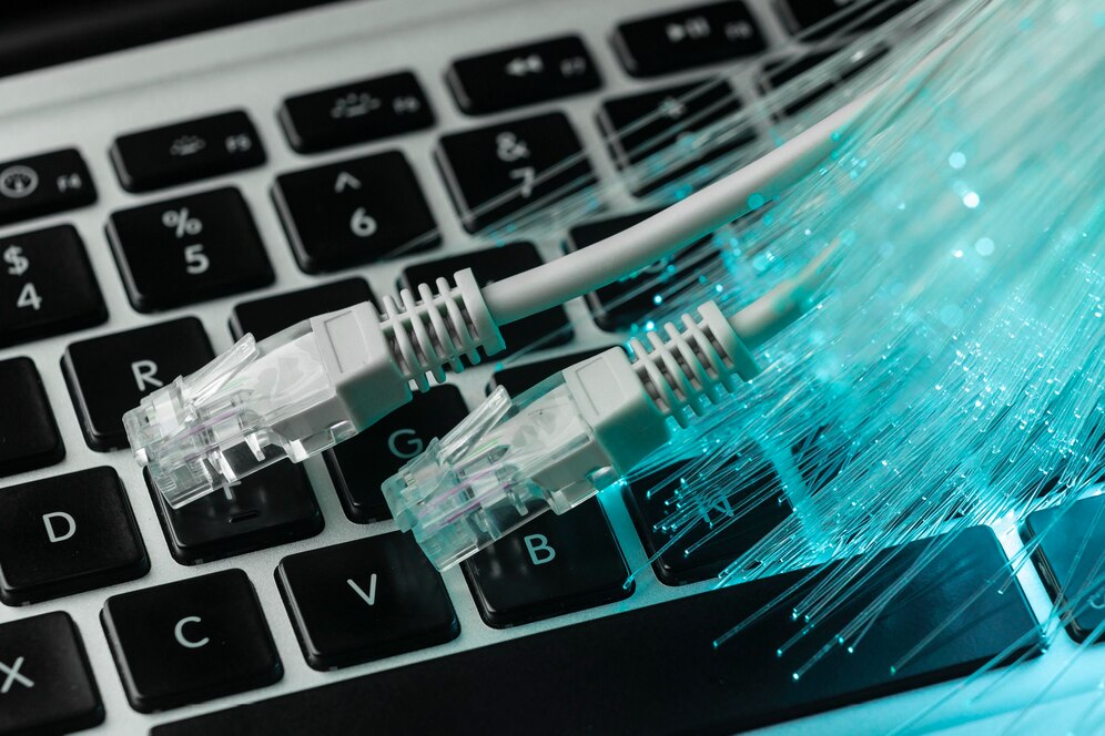 https://www.freepik.com/free-photo/blue-optic-fiber-with-ethernet-cables-laptop_11382410.htm#fromView=image_search&page=1&position=0&uuid=386b1c3e-8470-4f2e-bcfb-e5e5559982d3